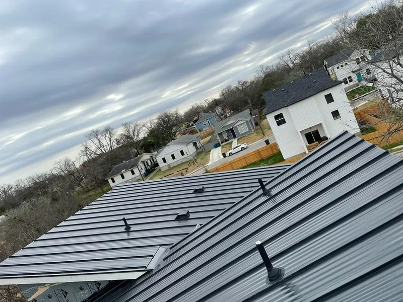 Standing seam metal roof panels with vents for Skylight Repair in Grandview Heights